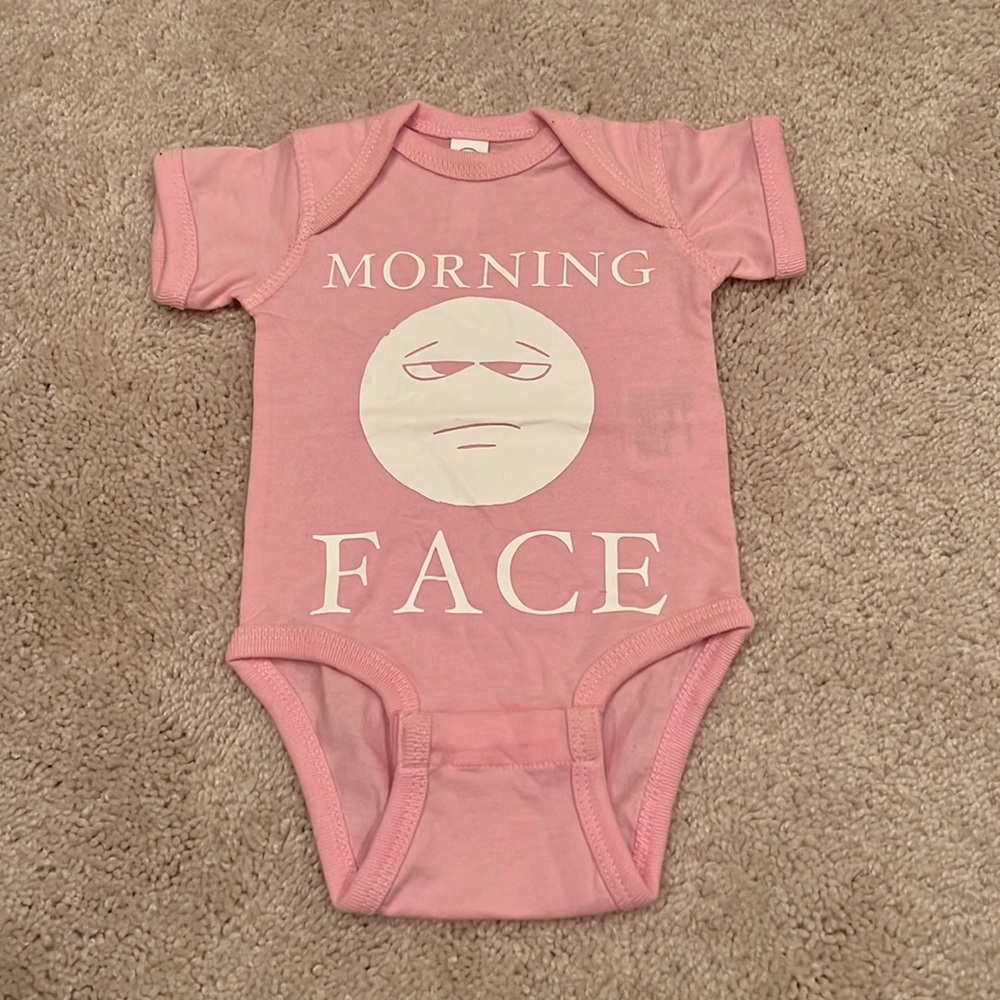 Pink and white BORDOM onesie